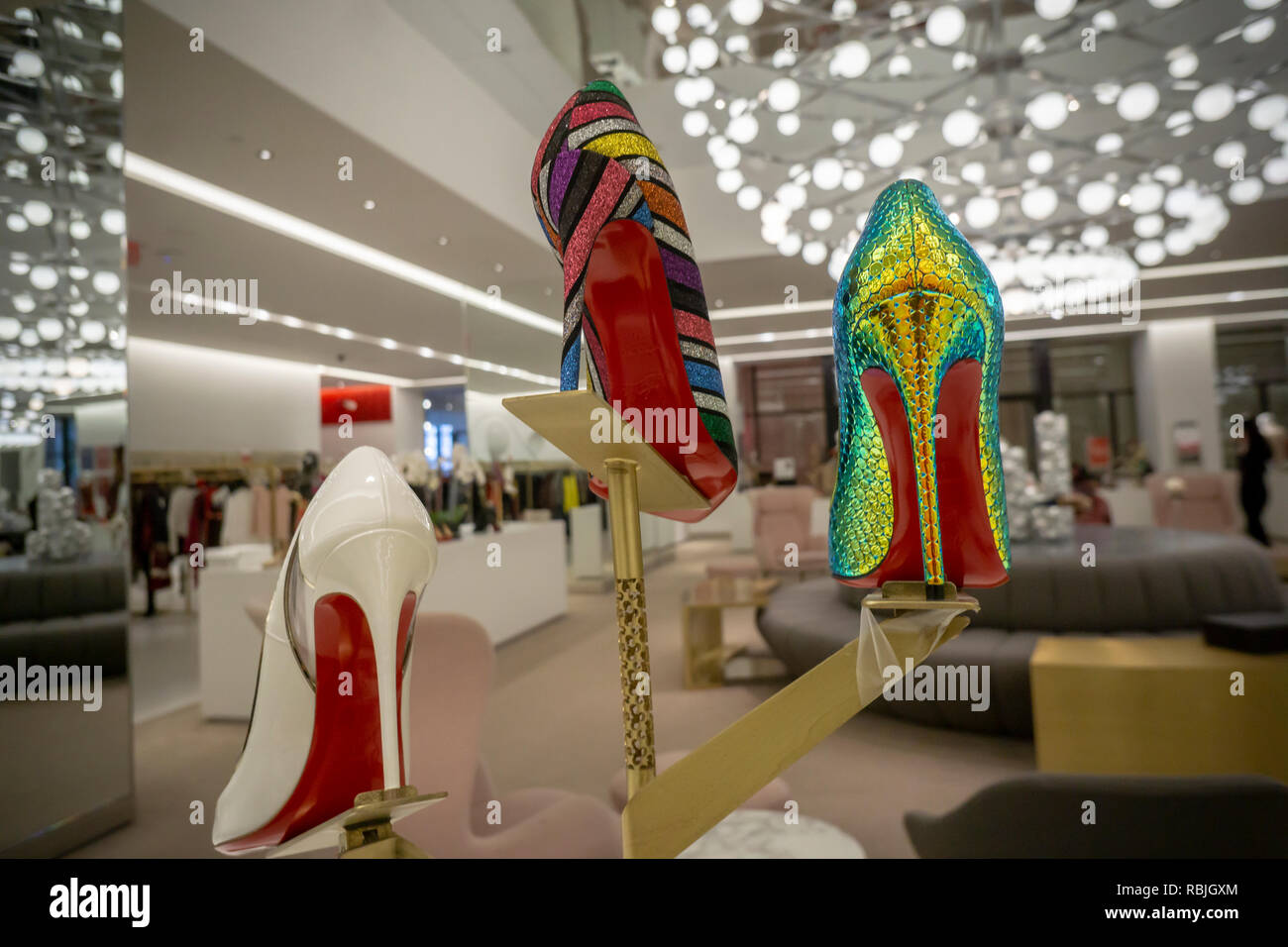 New York,NY/USA-January 5, 2019  The red lacquer soles of a selection Christian Louboutin high heel shoes in the Saks Fifth Avenue Brookfield Place women's store in Lower Manhattan in New York on its last day, Saturday, January 5, 2019.   (Â© Richard B. Levine) Stock Photo