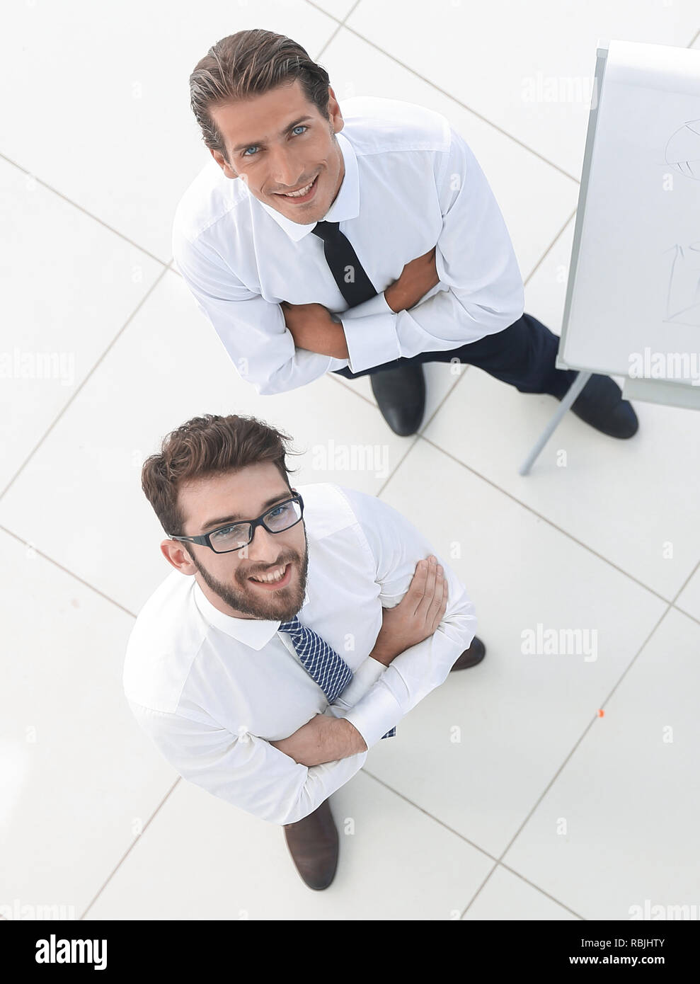 view from the top. business team standing in office hall Stock Photo ...