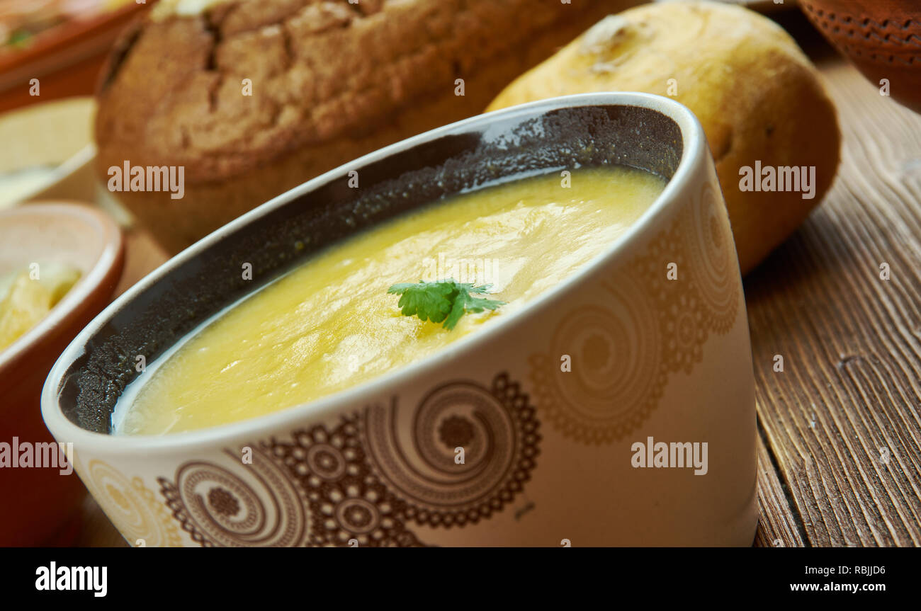 Cheddar Ale Soup, version of fondue., Irish cuisine, Traditional assorted dishes, Top view. Stock Photo
