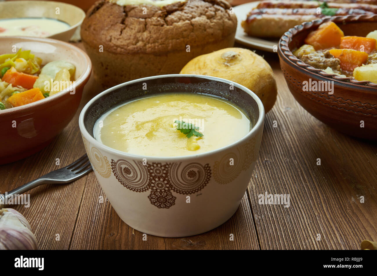 Cheddar Ale Soup, version of fondue., Irish cuisine, Traditional assorted dishes, Top view. Stock Photo