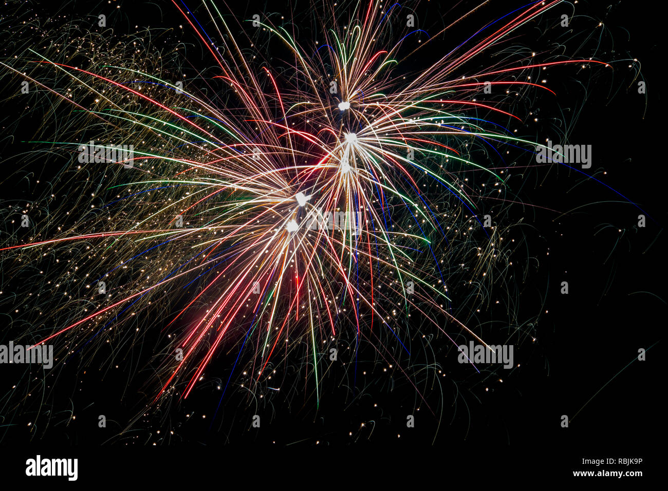 Fireworks exploding in the night sky Stock Photo - Alamy