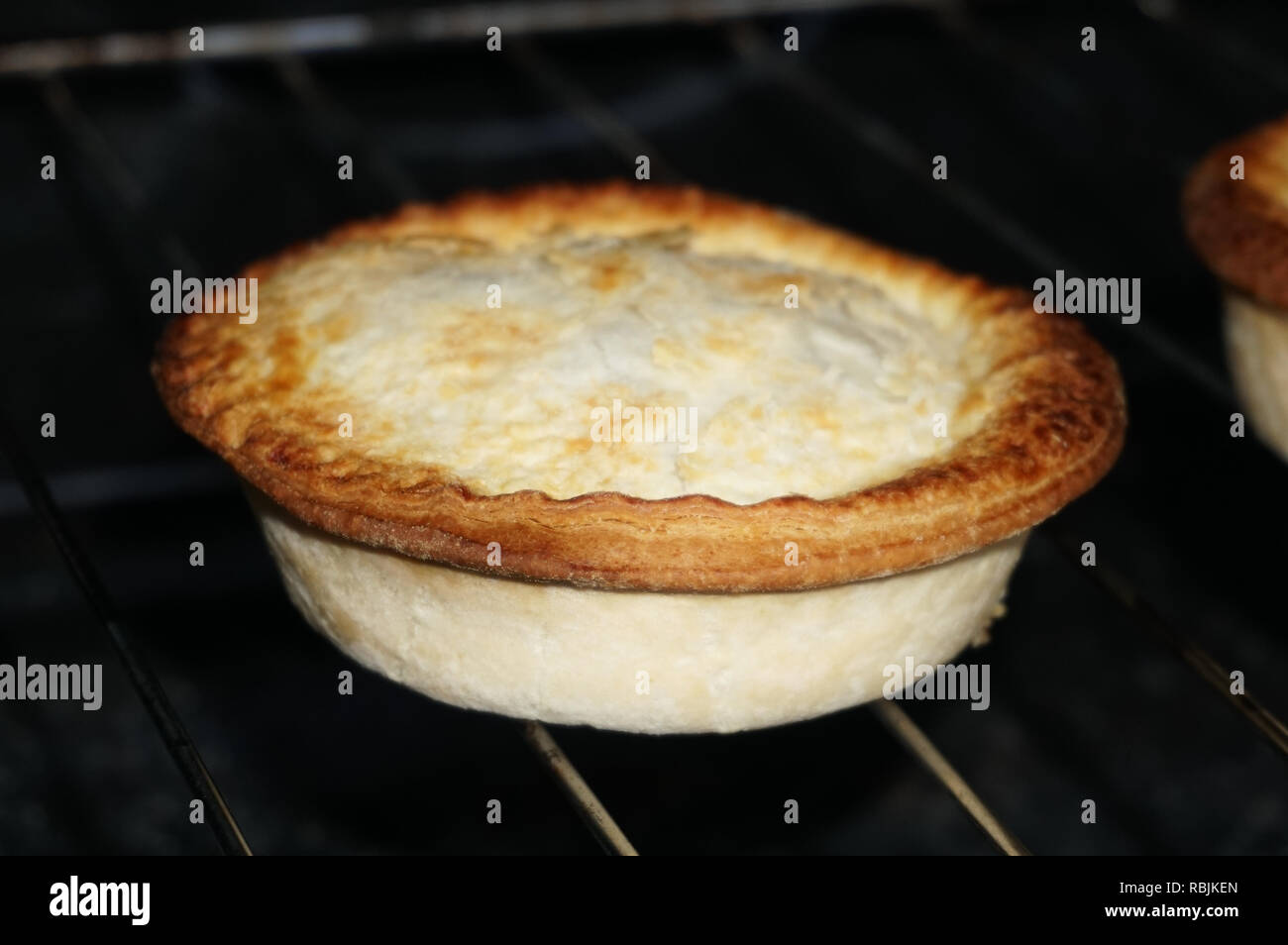 Australian Meat pie cooking in oven Stock Photo Alamy