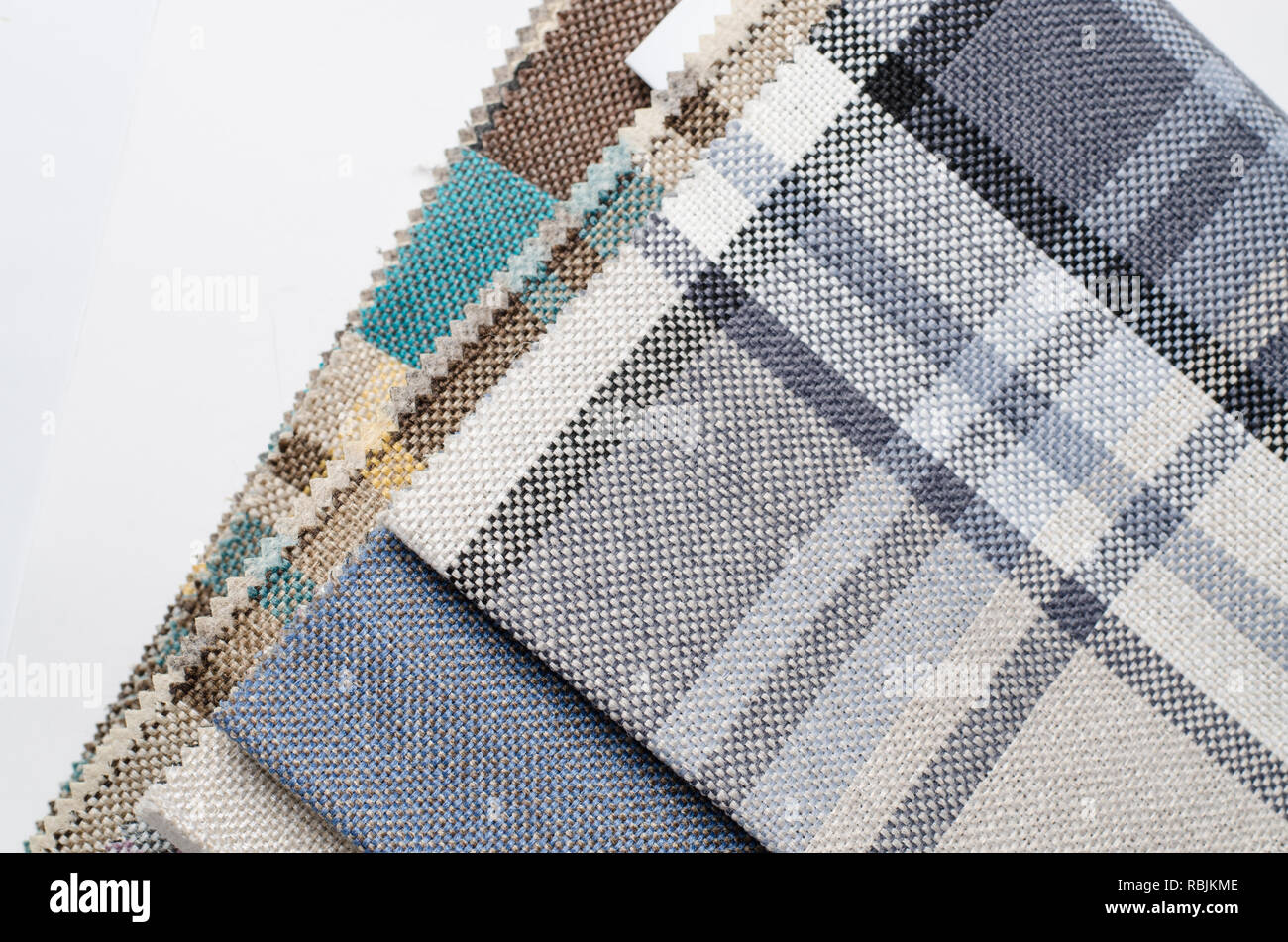 Bright collection of colorful gunny textile samples. Fabric texture background Stock Photo