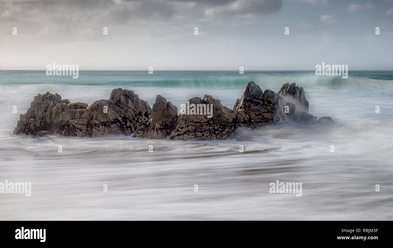 Ethereal swirling waters around some rocks in Ireland Stock Photo - Alamy