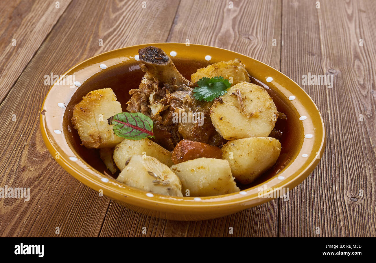 Greek lamb kleftiko with potatoes, oregano and lemon Stock Photo Alamy