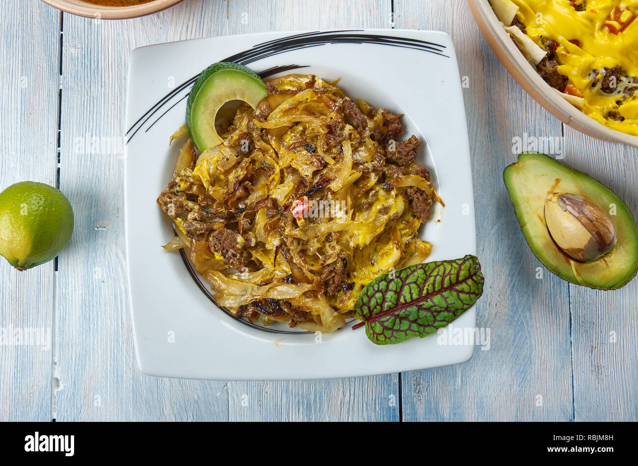 Tex Mex Cabbage Beef Skillet opped with Spicy Mexican Cheese Blend, Tex