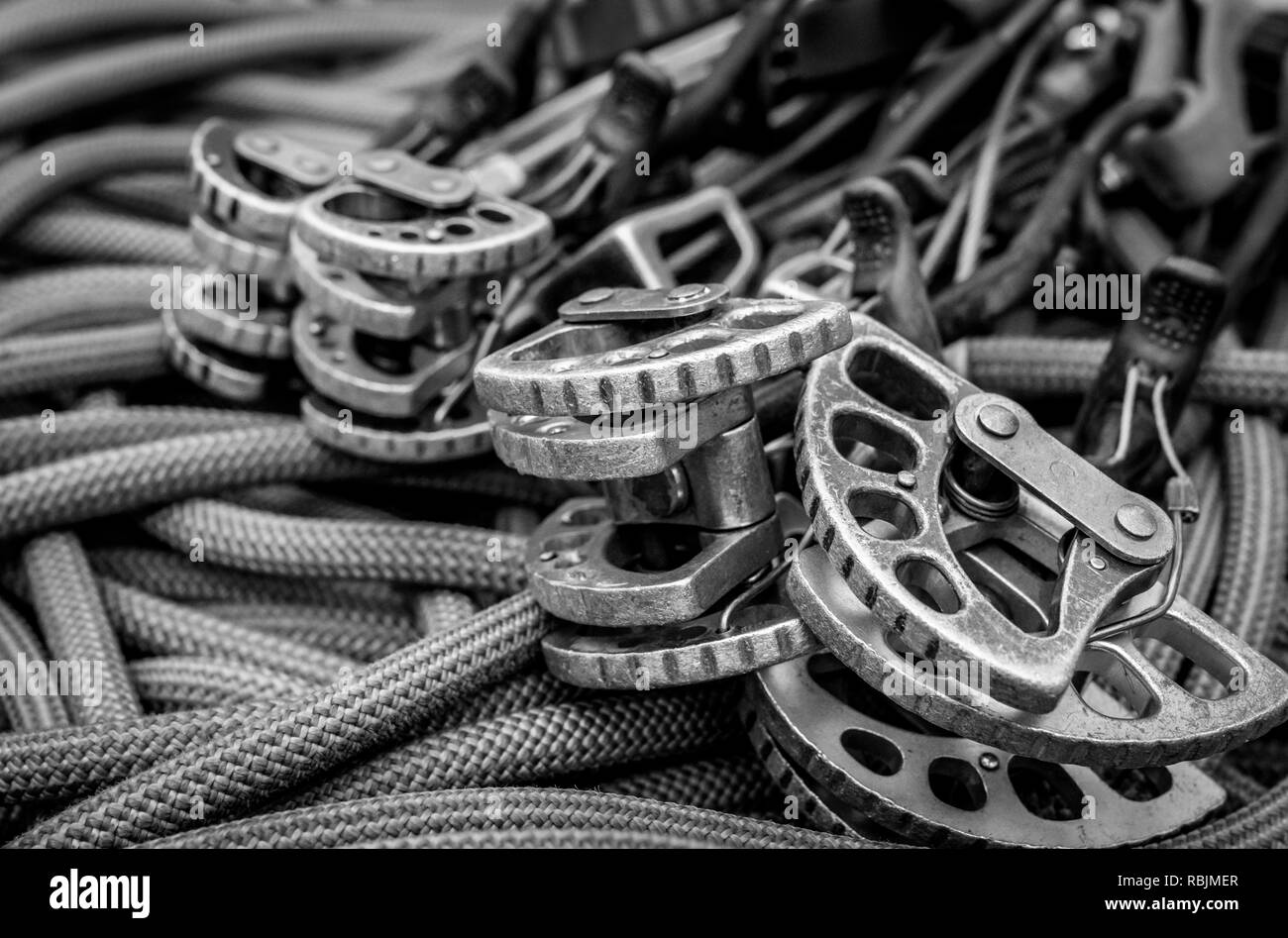 Traditional Rock Climbing Gear. Cams, Stoppers, Rope, Quickdraws, and shoes  Stock Photo - Alamy