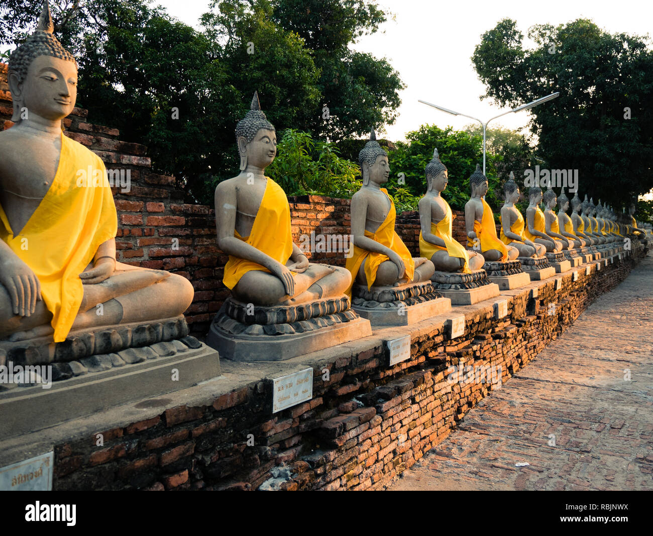 Buddha's apprentices in Wat Yai Chai Mongkol, Thailand Stock Photo