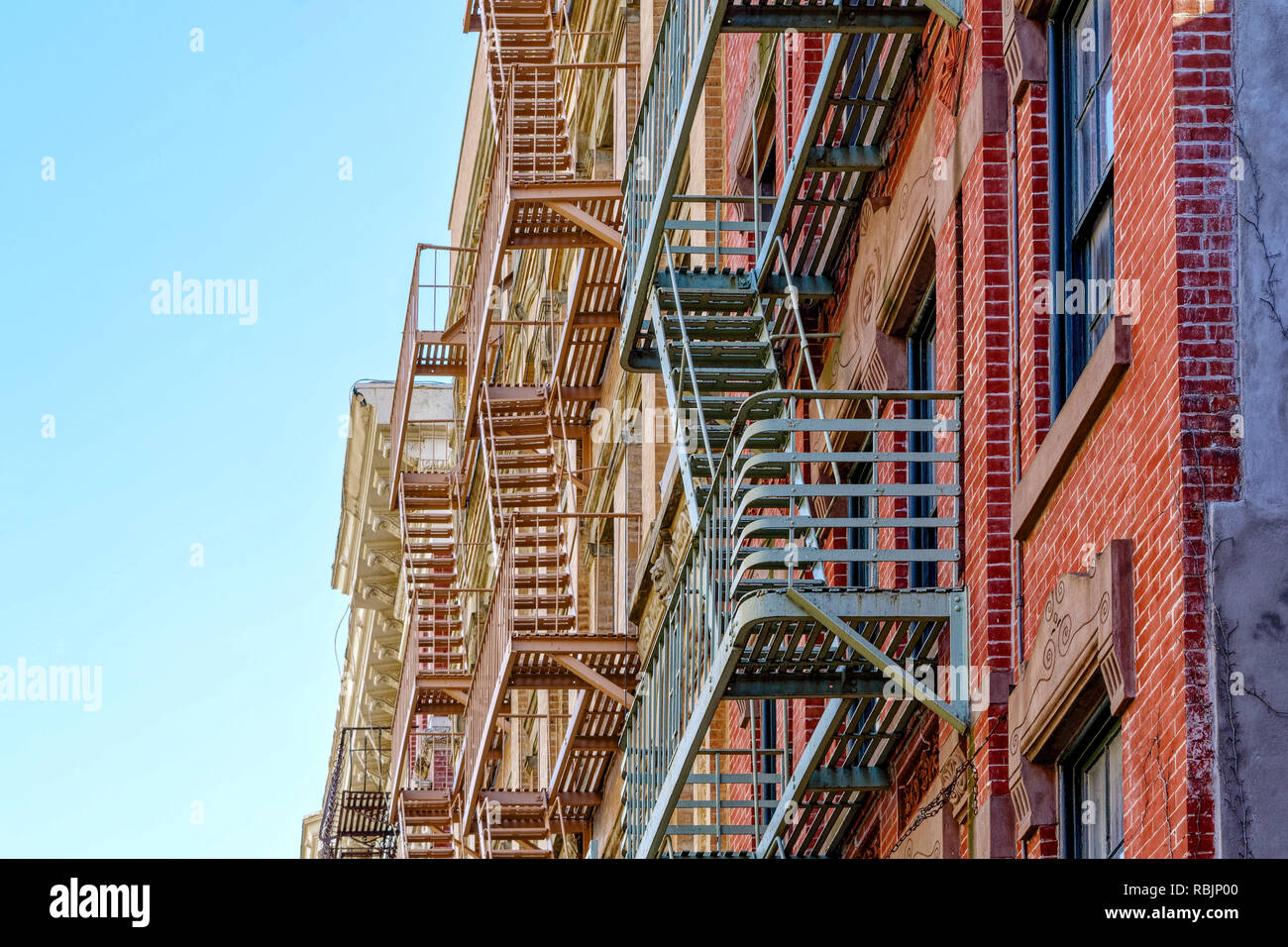New-York building facades with fire escape stairs close up view Stock Photo