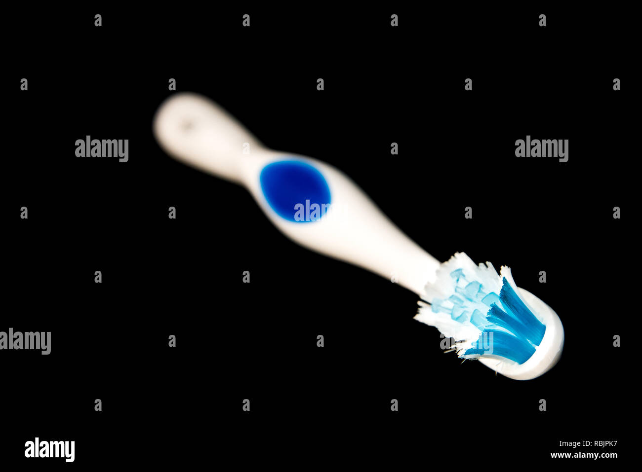 Toothbrush isolated on black background Stock Photo
