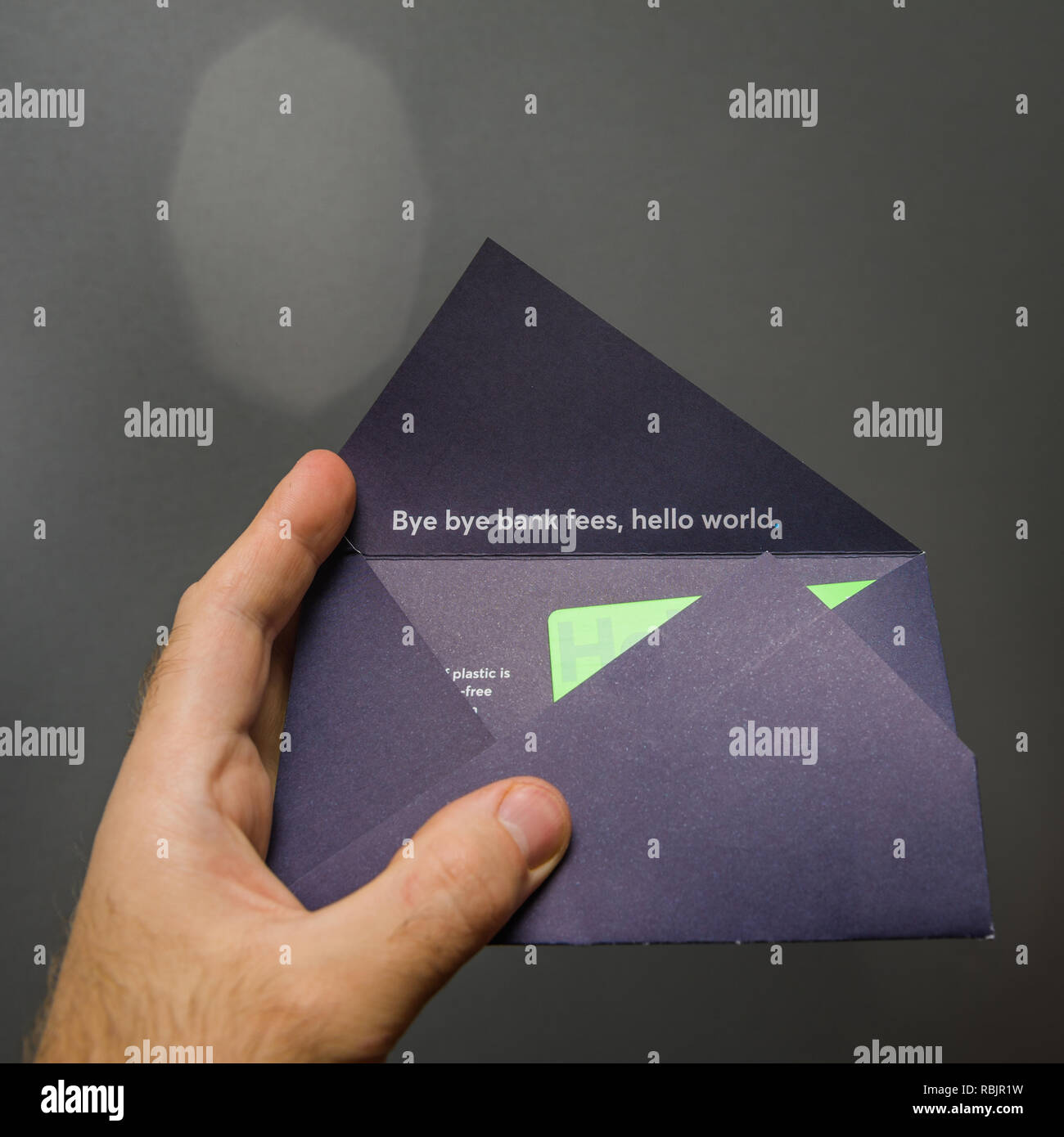 Paris France Mar 14 2018 Man Hand Unboxing New Transferwise Borderless Account Multi Currencies Mastercard Debit Card With Slogan Bye Bye Bank Fees Hello World Stock Photo Alamy