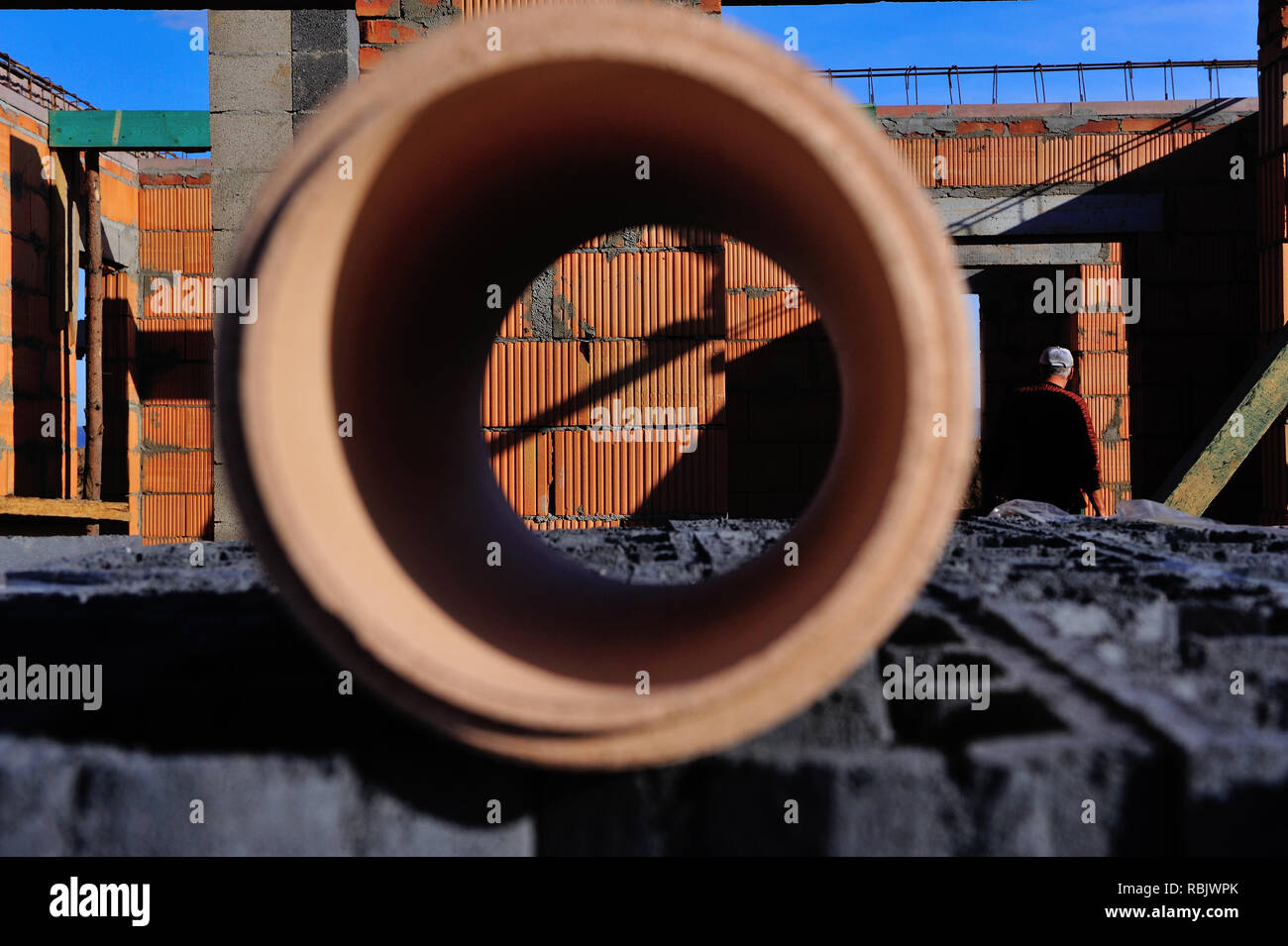 building, construction, business, company, developer, condition, raw, services, new, home, hauses, dangerous, work, human, traditional, cover, roofing Stock Photo