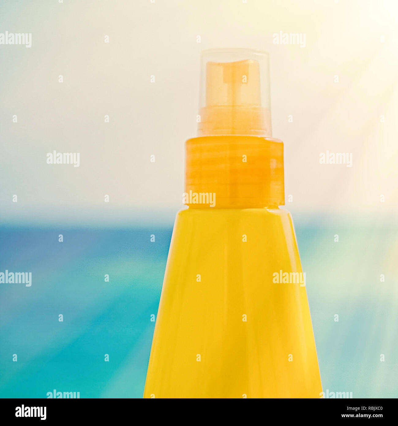 sun tan lotion on the beach cosmetics, summer, holidays, skin and