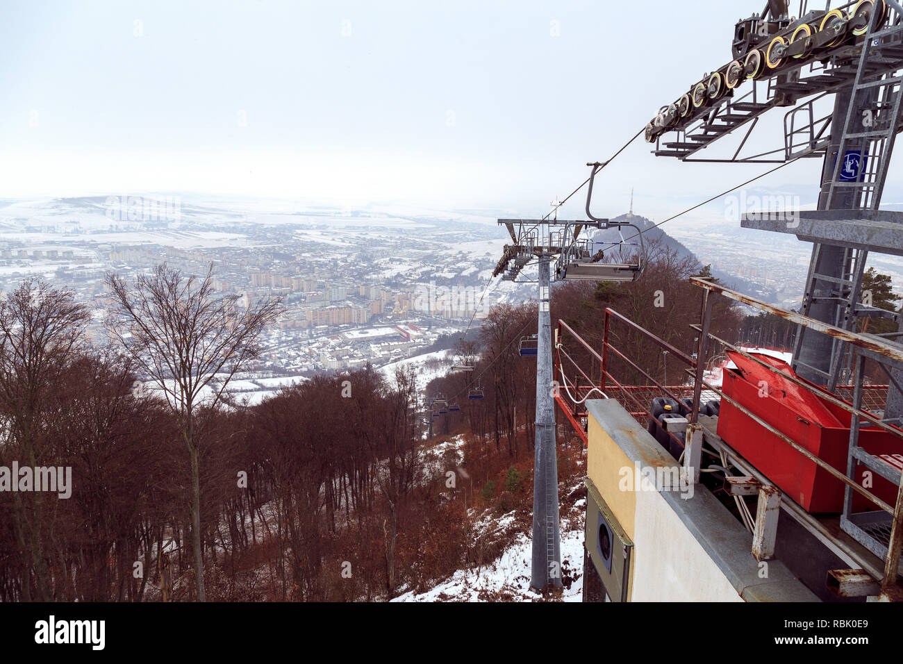 Ski cable in Piatra Neamt , Romania, arriving on top of mountain view on winter day Stock Photo