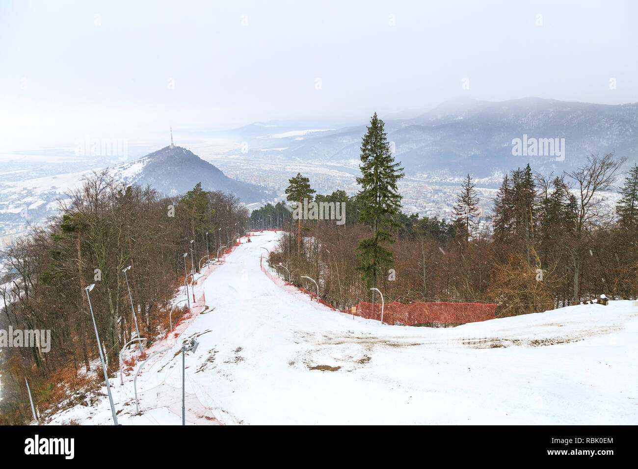 Ski slope from Piatra Neamt , Romania at the beginning of winter Stock Photo