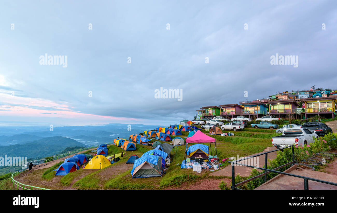 PHETCHABUN, THAILAND-OCT 24, 2018: Tourists, cars, tents and resorts on camping areas at Phu Thap Berk viewpoint surrounded by the beautiful nature of Stock Photo