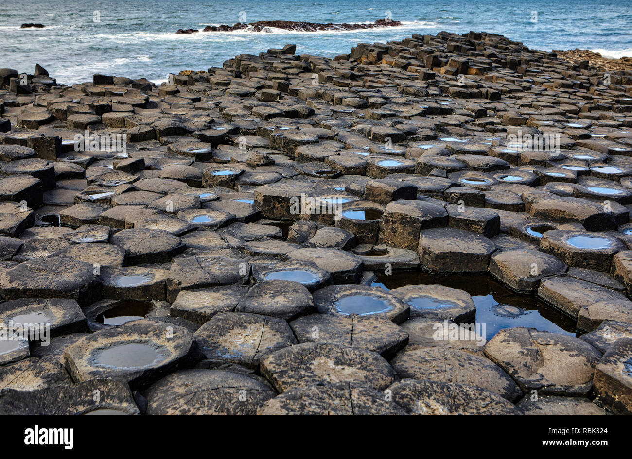 Giant's Causeway, the result of an ancient folcano eruption and listed as a  World Heritage Site, in Northern Ireland. Stock Photo