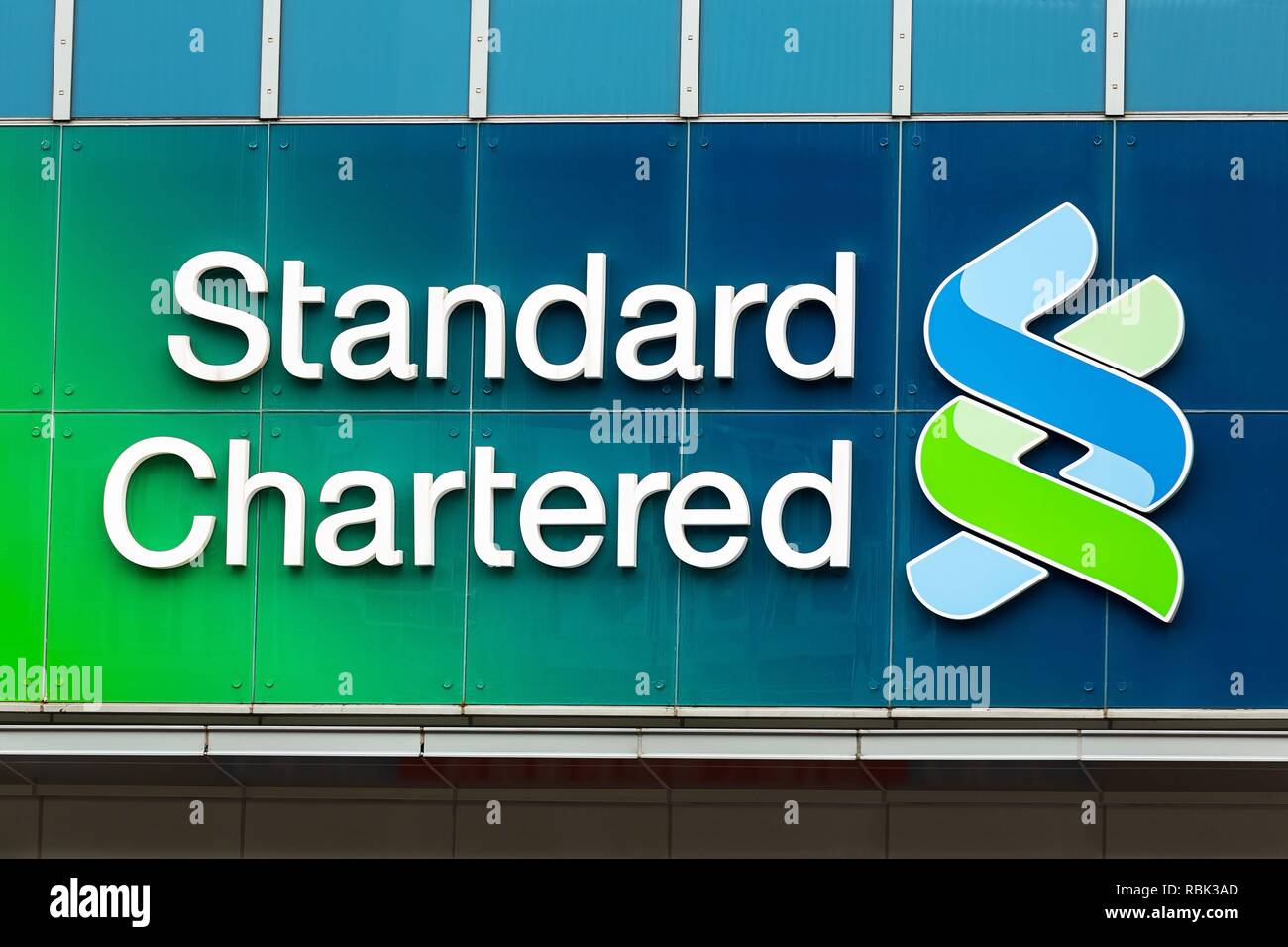 A Standard Chartered Bank logo seen in Hong Kong Stock Photo - Alamy
