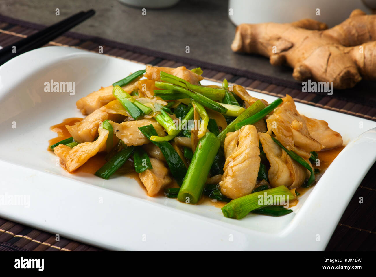 chinese stir fry ginger spring onion chicken Stock Photo Alamy