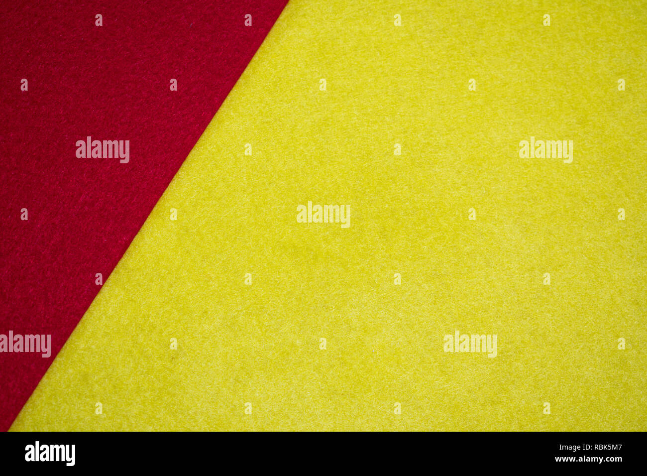 Red and yellow colors acrylic felt fabric wallpaper Stock Photo - Alamy