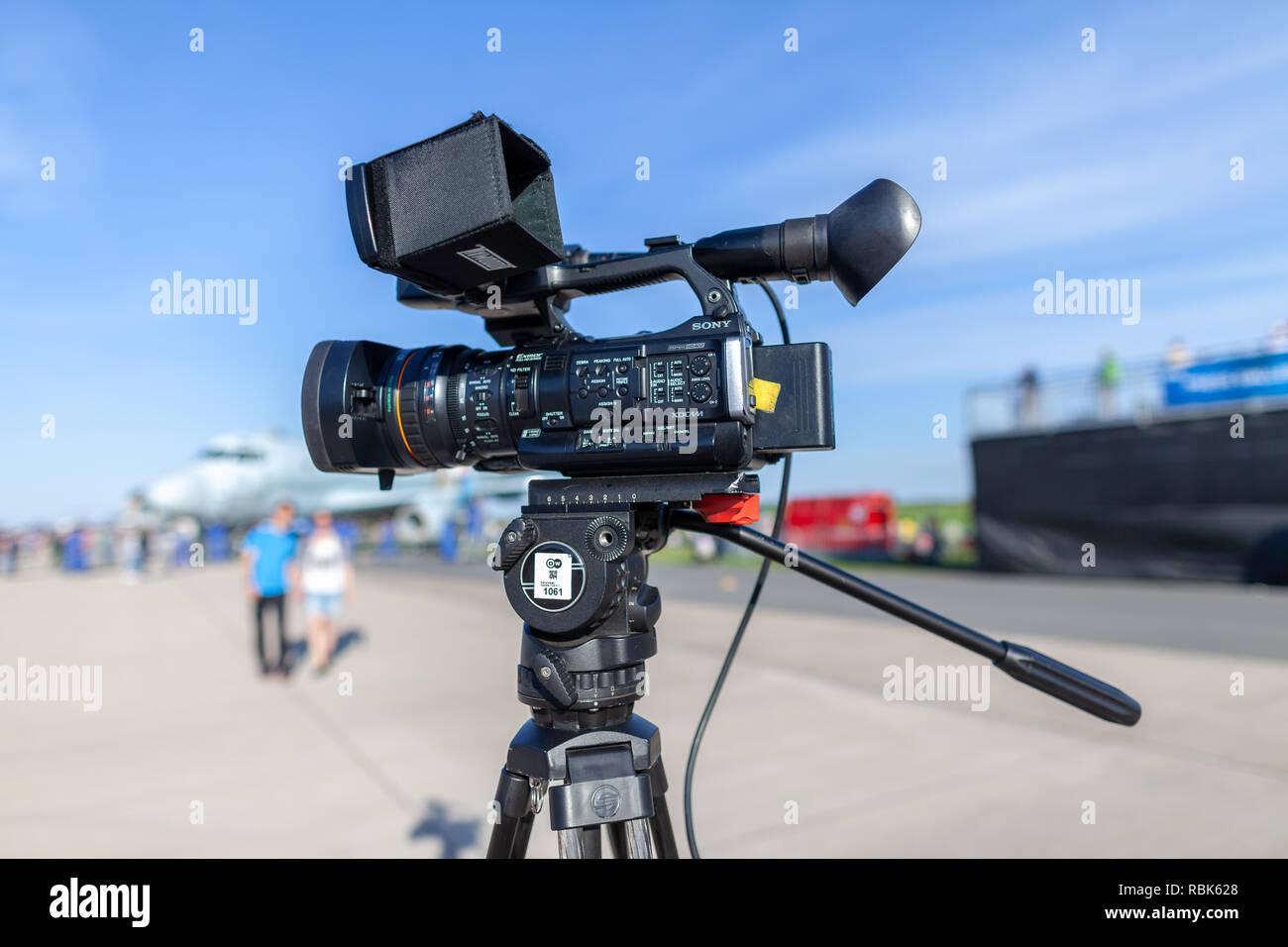 BERLIN / GERMANY - APRIL 28, 2018: Sony XDCAM film camera stands on tripod at Berlin Air show Stock Photo