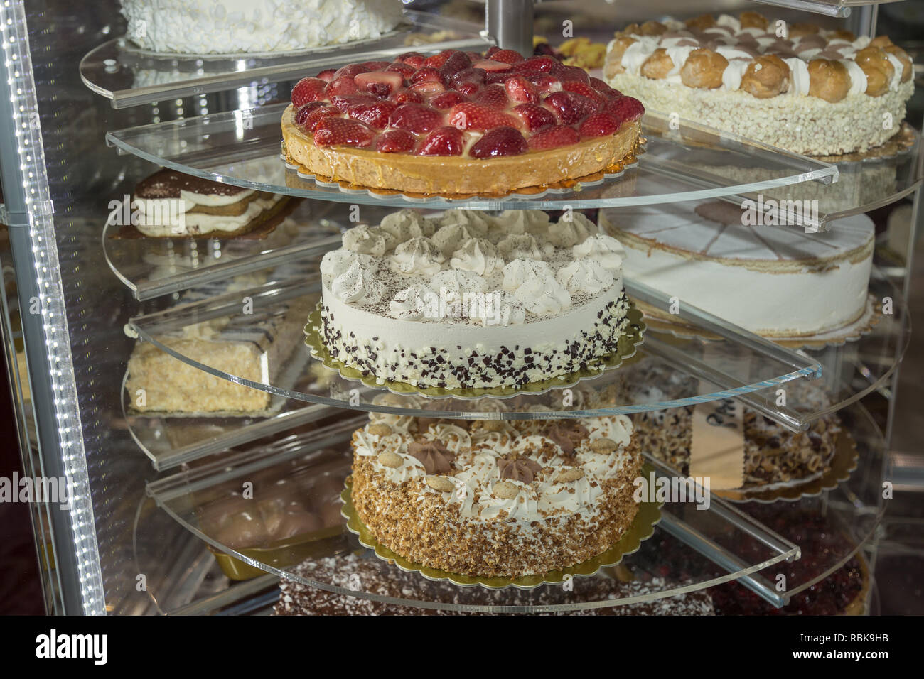 Several Types of Stuffed Cakes inside a Pastry Display Stand Stock ...