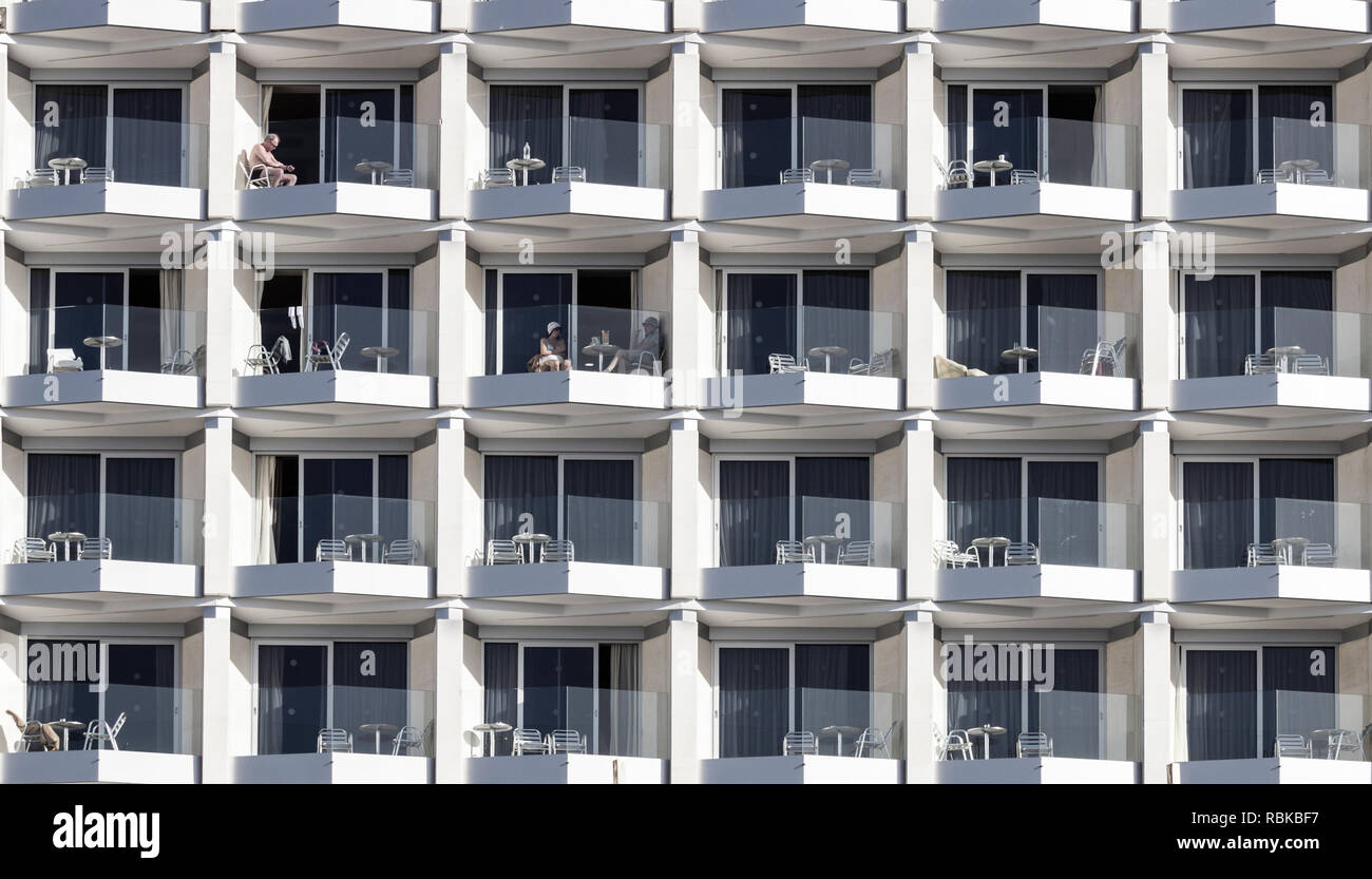 Tourists on balconies in hotel in Spain Stock Photo