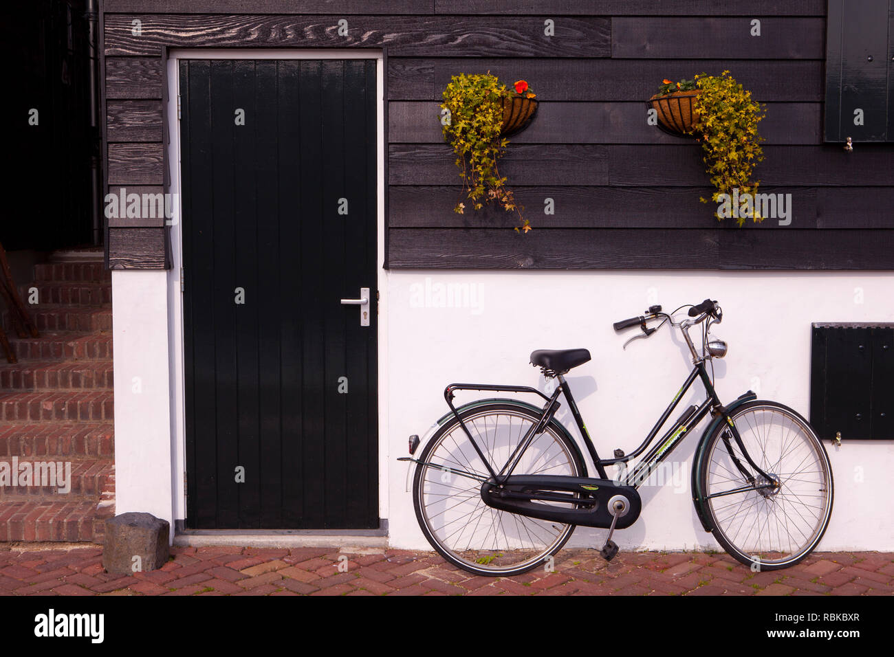 Bicycle outside a house in Spakenburg, Netherlands Stock Photo