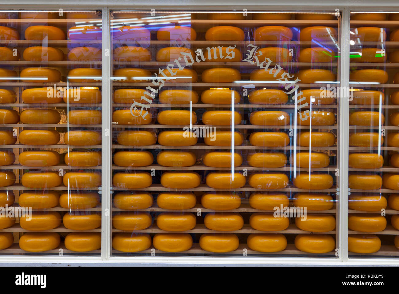 Dutch cheese shop with a window full of cheeses, Amsterdam, Netherlands. Stock Photo