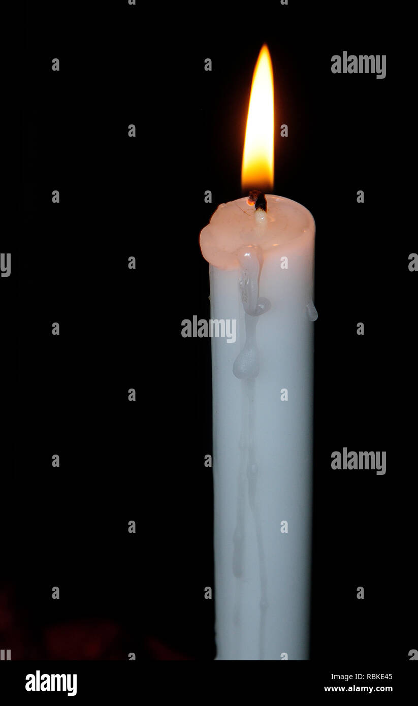 Lit candle during power outage Stock Photo Alamy