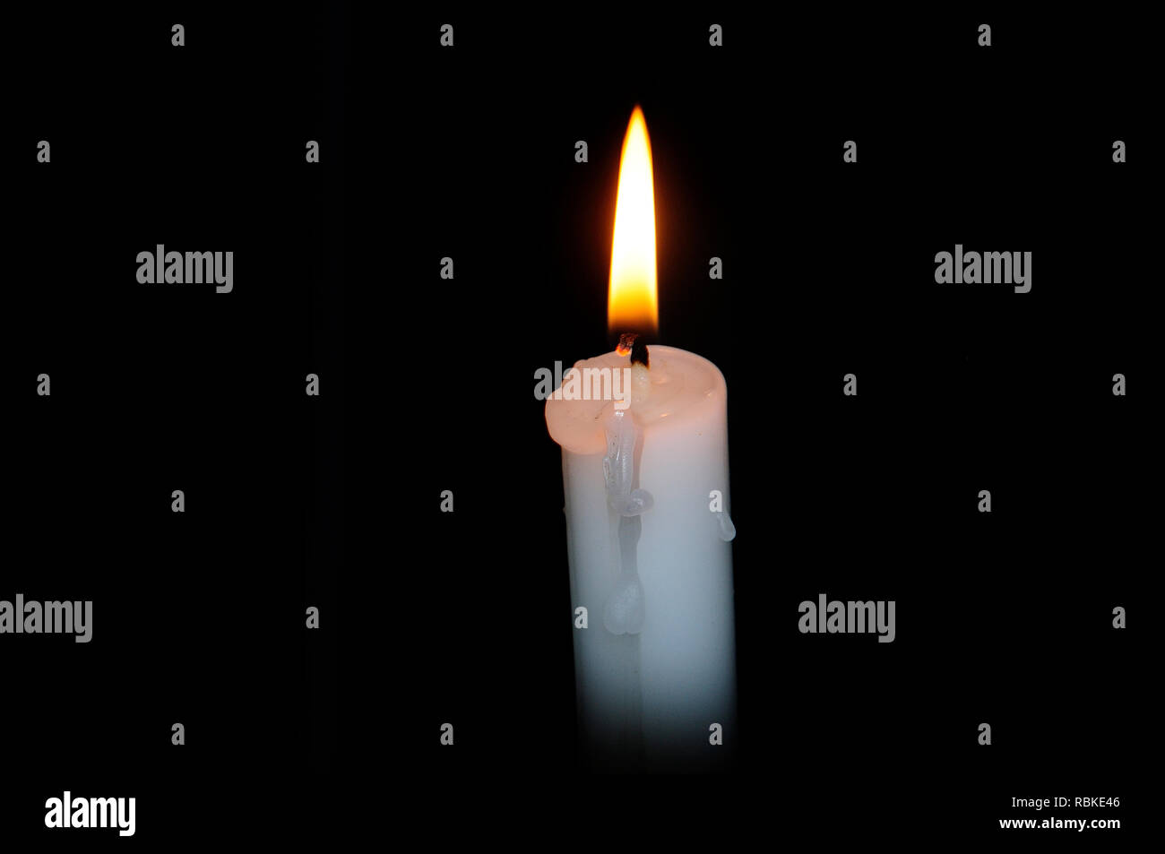 Lit candle during power outage Stock Photo Alamy