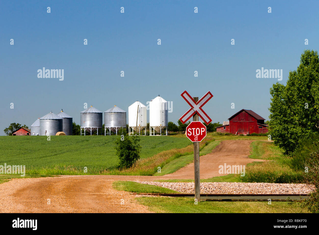 Rural landscape railroad crossing of the ghost town of Rowley, Alberta, Canada. Stock Photo