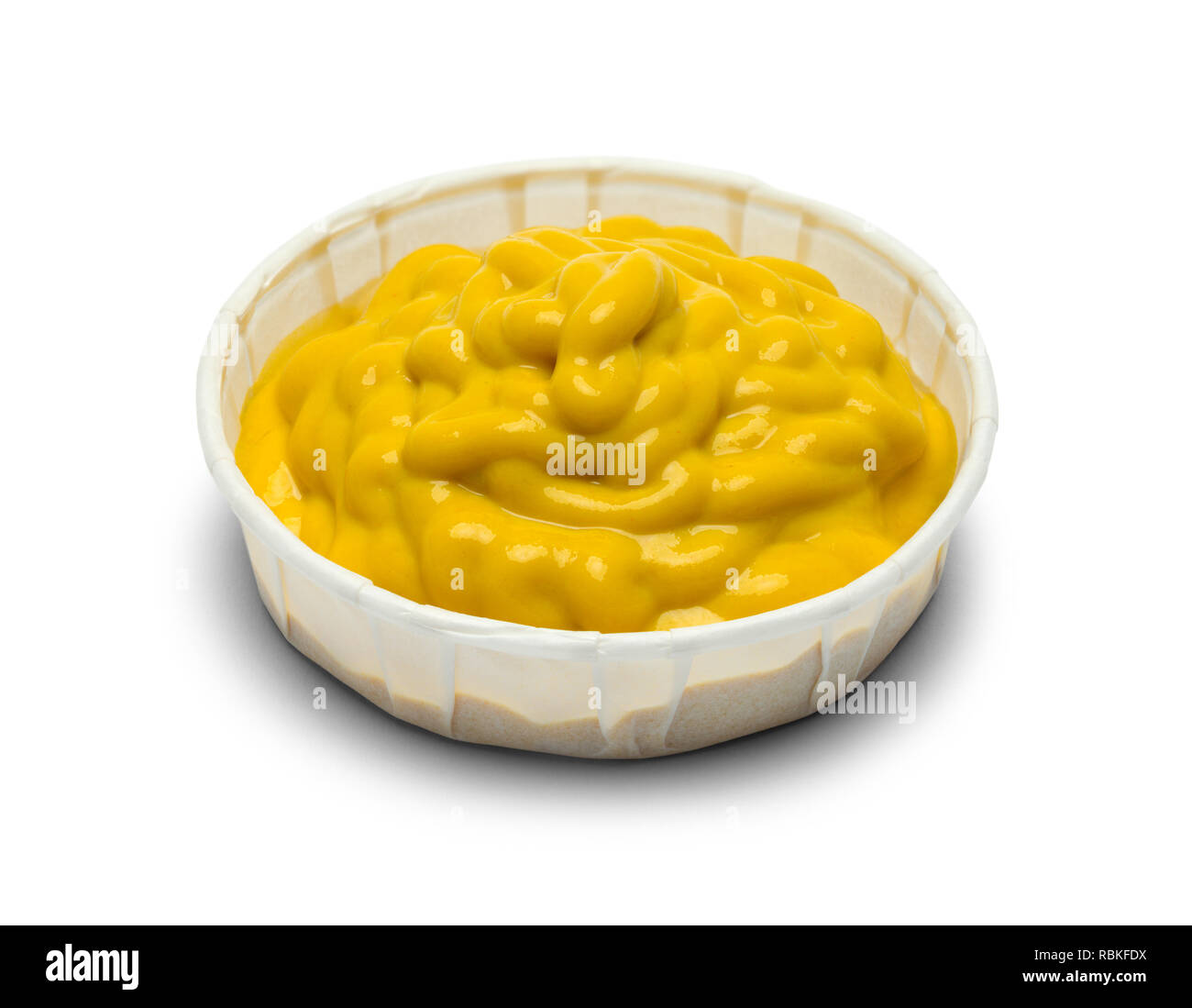 Paper Cup With Yellow Mustard Isolated on White Background. Stock Photo