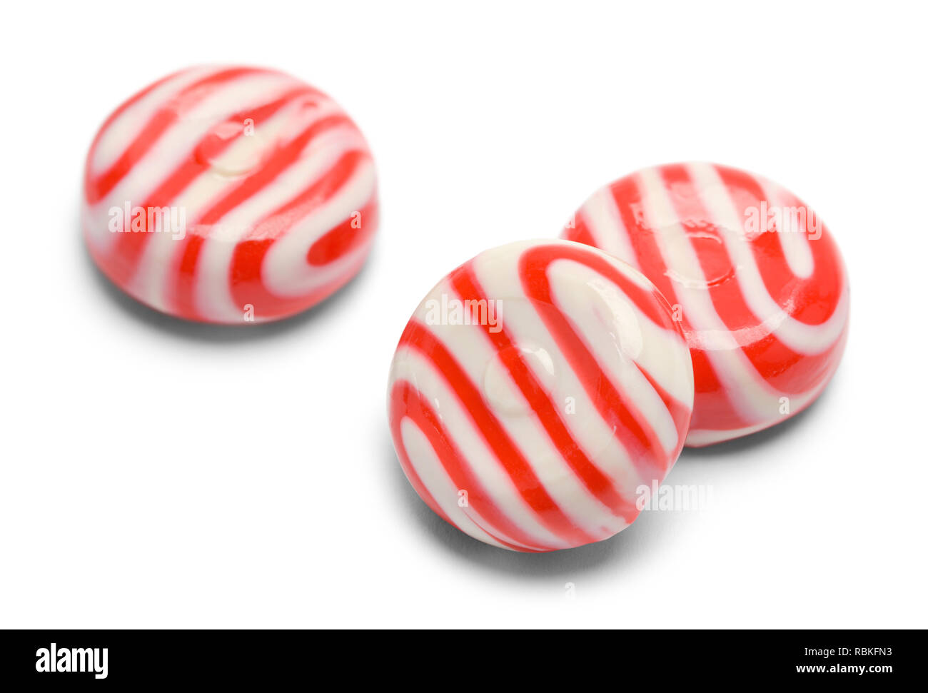 Three Peppermint Candies Isolated on White Background. Stock Photo
