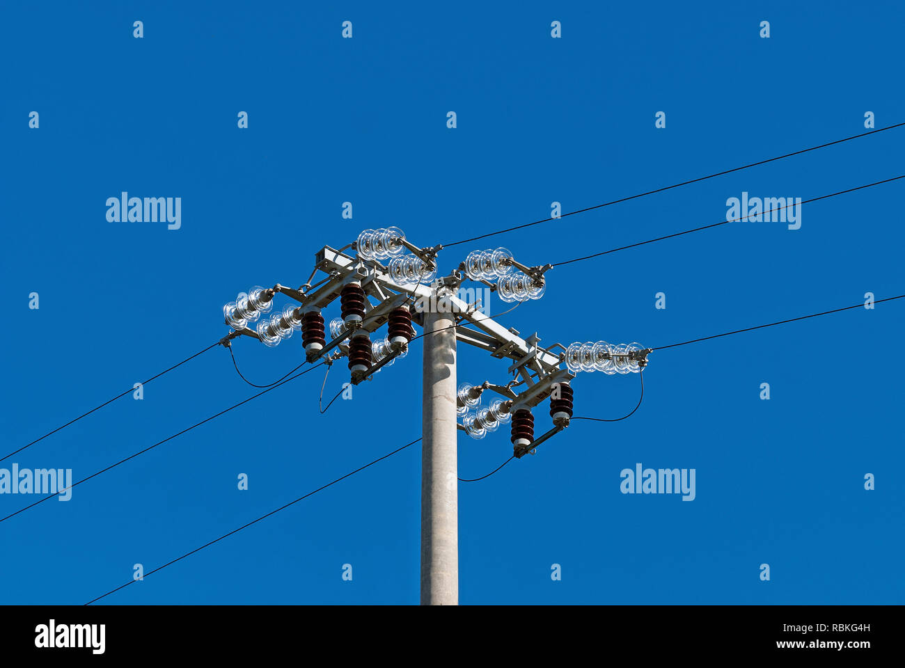 Hydro pole with arresters and wires Stock Photo
