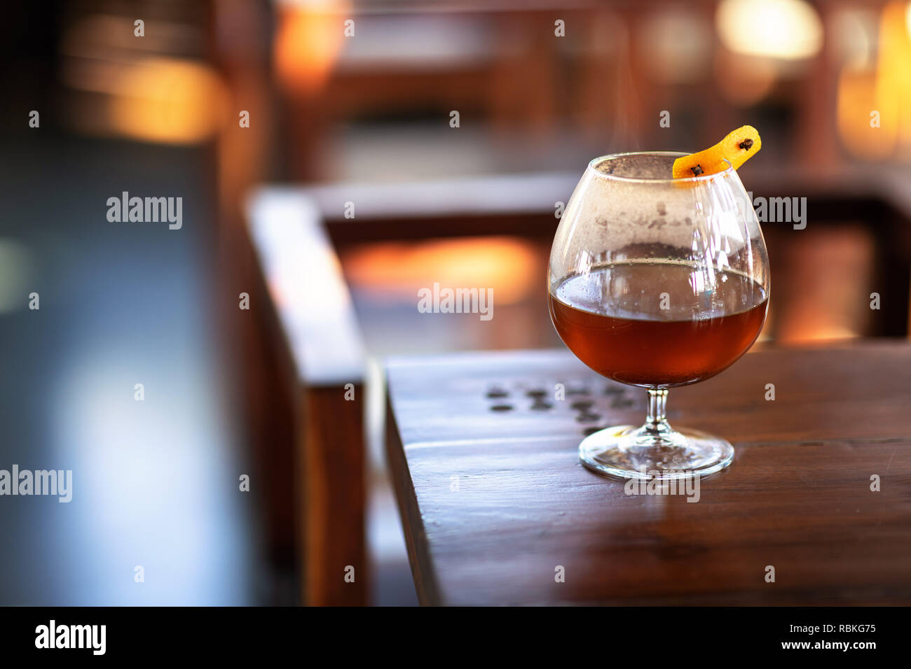 Apple Cider in brandy glass Stock Photo Alamy