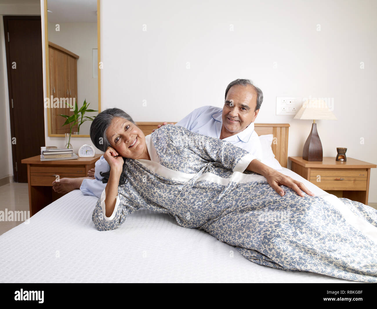 Old man lying in bed hi-res stock photography and images - Alamy