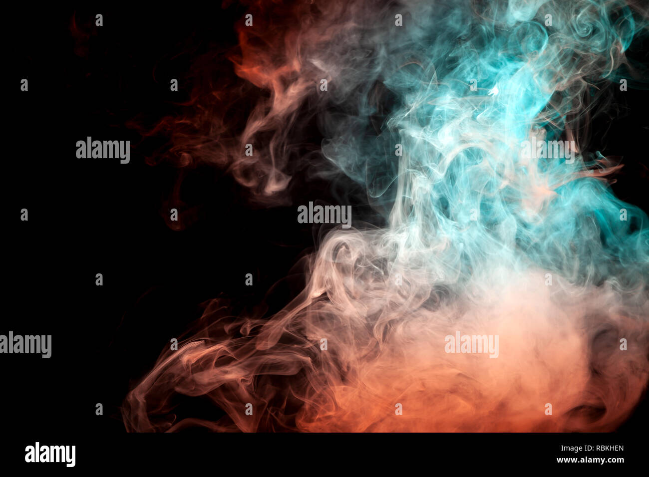 Background of orange, white and blue wavy smoke on a black isolated ...
