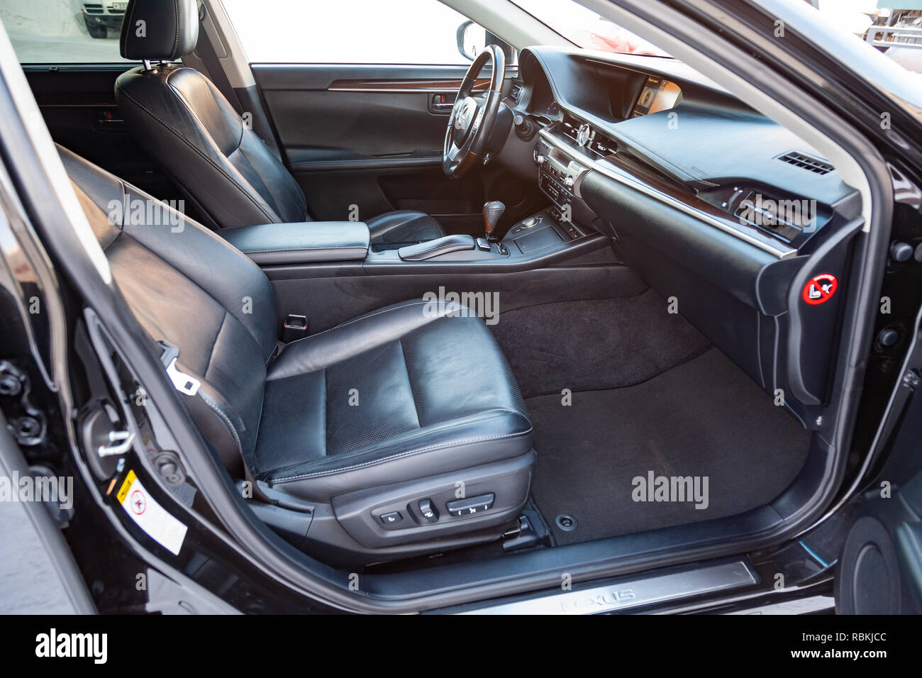 Interior inside the car front passenger seat, overwhelmed with genuine