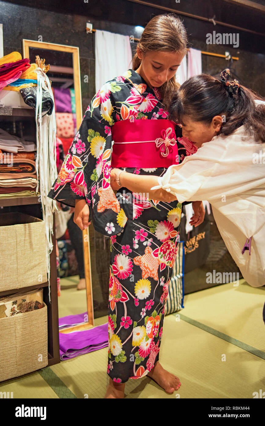 A pretty girl in a kimono. Kimono is the traditional dress worn popular in  Japan.European girl in kimono.Portrait of girl wearing japanese traditional  Stock Photo - Alamy