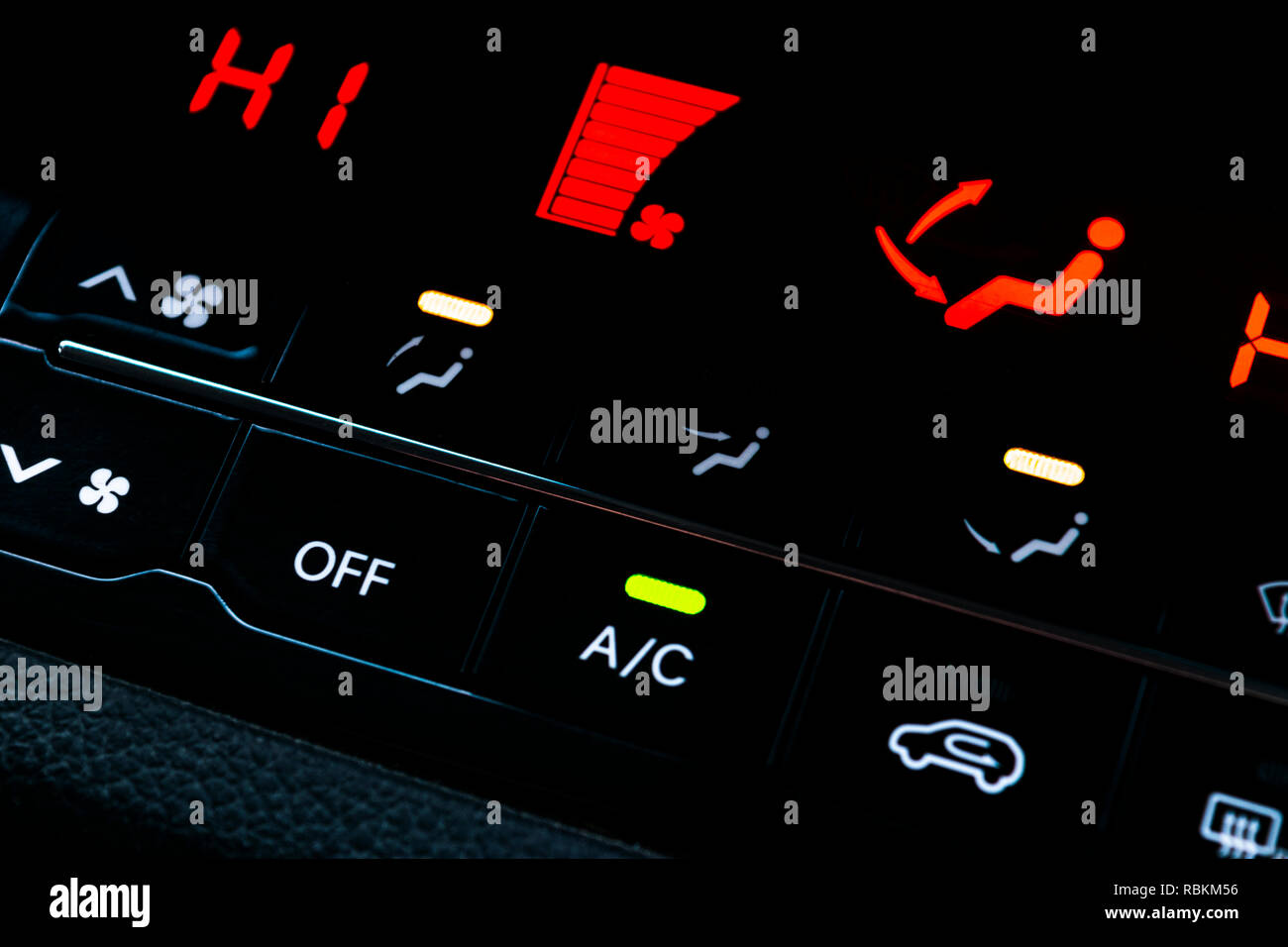 Air conditioning button inside a car. Climate control AC unit in the new car. Modern car interior details Stock Photo