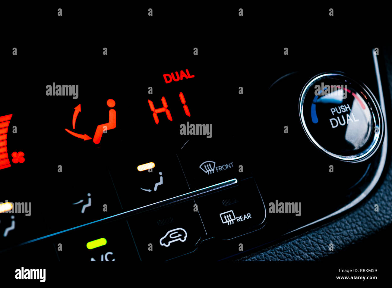 Air conditioning button inside a car. Climate control AC unit in the