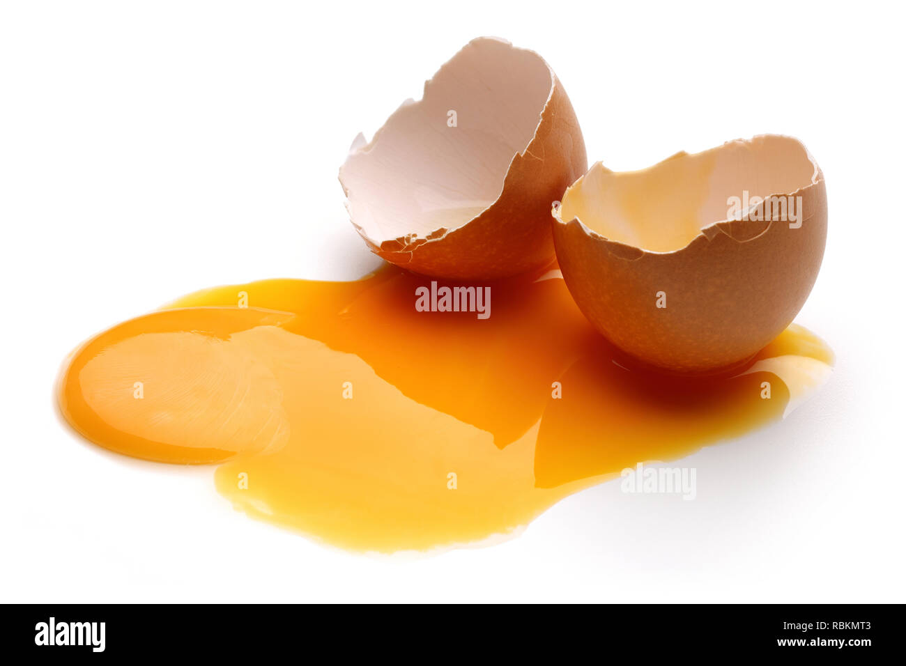 Broken egg isolated on white background Stock Photo