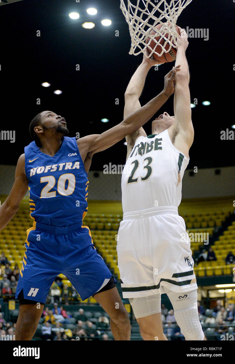 Williamsburg, VA, USA. 10th Jan, 2019. 20190110 - William and Mary forward JUSTIN PIERCE (23) grabs an offensive rebound against Hofstra guard JALEN RAY (20) in the first half at Kaplan Arena in Williamsburg, Va. Credit: Chuck Myers/ZUMA Wire/Alamy Live News Stock Photo