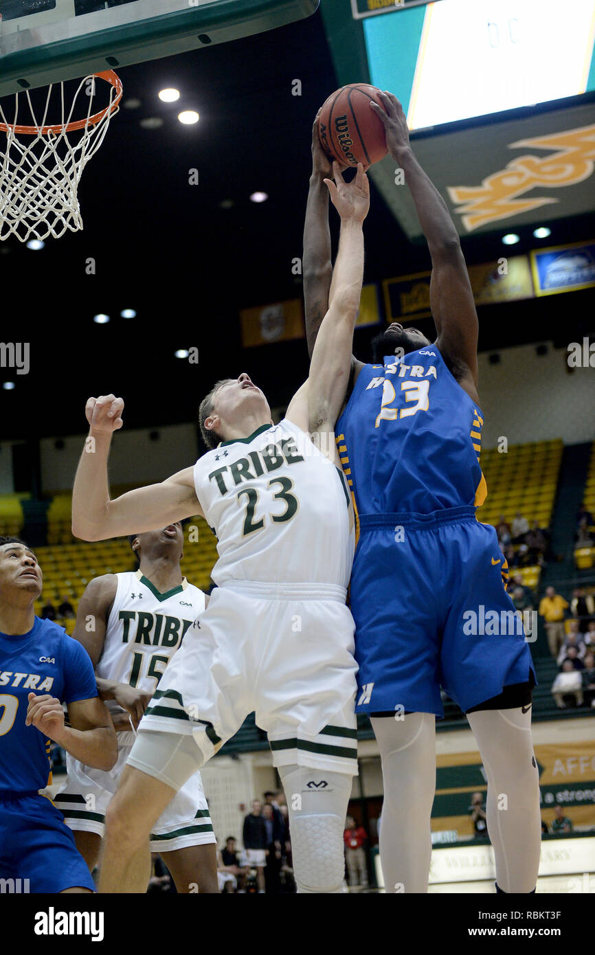 Williamsburg, VA, USA. 10th Jan, 2019. 20190110 - William and Mary forward JUSTIN PIERCE (23), left, and Hofstra forward JACQUIL TAYLOR (23) reach for a rebound in the second half at Kaplan Arena in Williamsburg, Va. Credit: Chuck Myers/ZUMA Wire/Alamy Live News Stock Photo