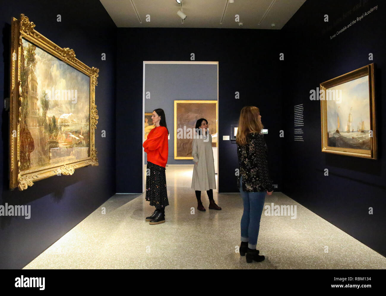 London, UK. 11th Jan, 2019. Staff members seen viewing paintings by John Constable and J.M.W Turner.The Royal Academy Schools' most illustrious graduates, exhibits Helvoetsluys ('Helvoetsluys; - the City of Utrecht, 64, going to sea') 1832 by J.M.W. Turner (1775-1851) and The opening of Waterloo Bridge ('Waterloo Bridge, from the Whitehall Stairs, 18th June 1817) by John Constable (1776-1837), in, are-telling of one of the most legendary events in the history of the Summer Exhibition, it toke place at the Royal Academy of Arts. The two paintings were reunited for the firs Stock Photo