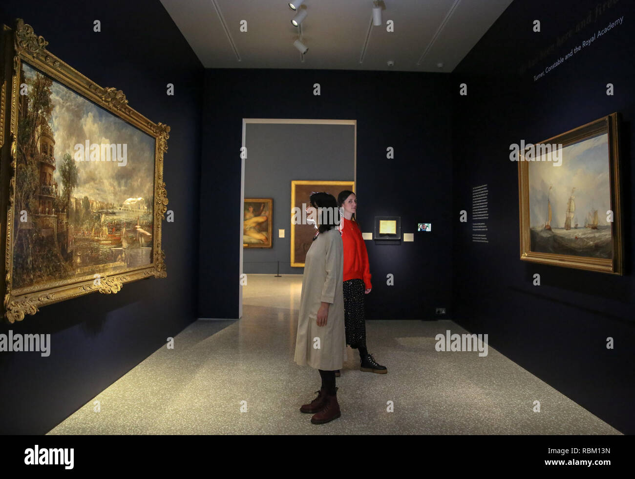 London, UK. 11th Jan, 2019. Staff members seen viewing paintings by John Constable and J.M.W Turner.The Royal Academy Schools' most illustrious graduates, exhibits Helvoetsluys ('Helvoetsluys; - the City of Utrecht, 64, going to sea') 1832 by J.M.W. Turner (1775-1851) and The opening of Waterloo Bridge ('Waterloo Bridge, from the Whitehall Stairs, 18th June 1817) by John Constable (1776-1837), in, are-telling of one of the most legendary events in the history of the Summer Exhibition, it toke place at the Royal Academy of Arts. The two paintings were reunited for the firs Stock Photo