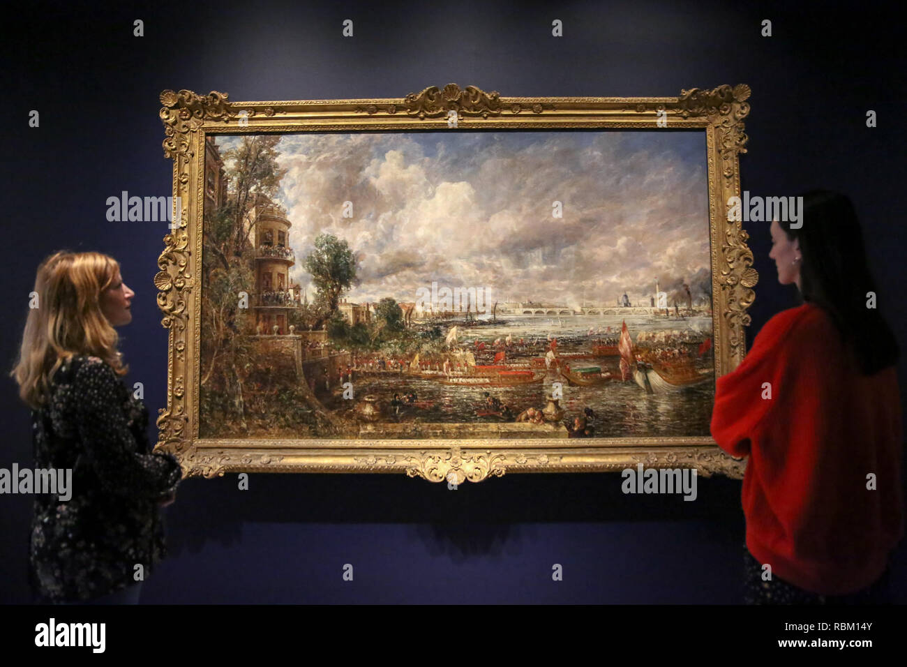London, UK. 11th Jan, 2019. Staff members seen viewing a painting by John Constable.The Royal Academy Schools' most illustrious graduates, exhibits Helvoetsluys ('Helvoetsluys; - the City of Utrecht, 64, going to sea') 1832 by J.M.W. Turner (1775-1851) and The opening of Waterloo Bridge ('Waterloo Bridge, from the Whitehall Stairs, 18th June 1817) by John Constable (1776-1837), in, are-telling of one of the most legendary events in the history of the Summer Exhibition, it toke place at the Royal Academy of Arts. The two paintings were reunited for the first time since the Stock Photo