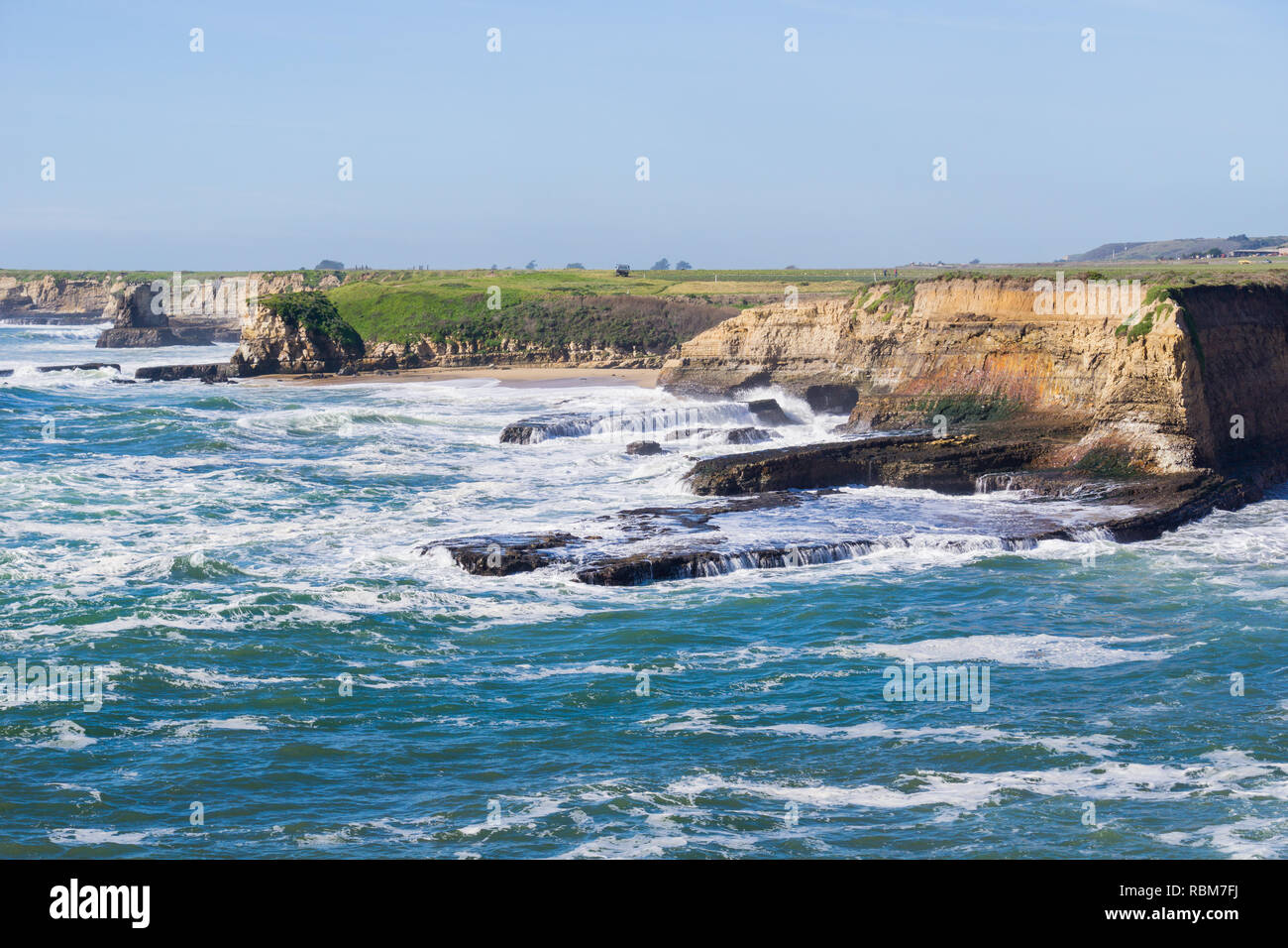 Dramatic landscape of the Pacific Ocean Coast during high tide and strong surf, Wilder Ranch State Park, California Stock Photo
