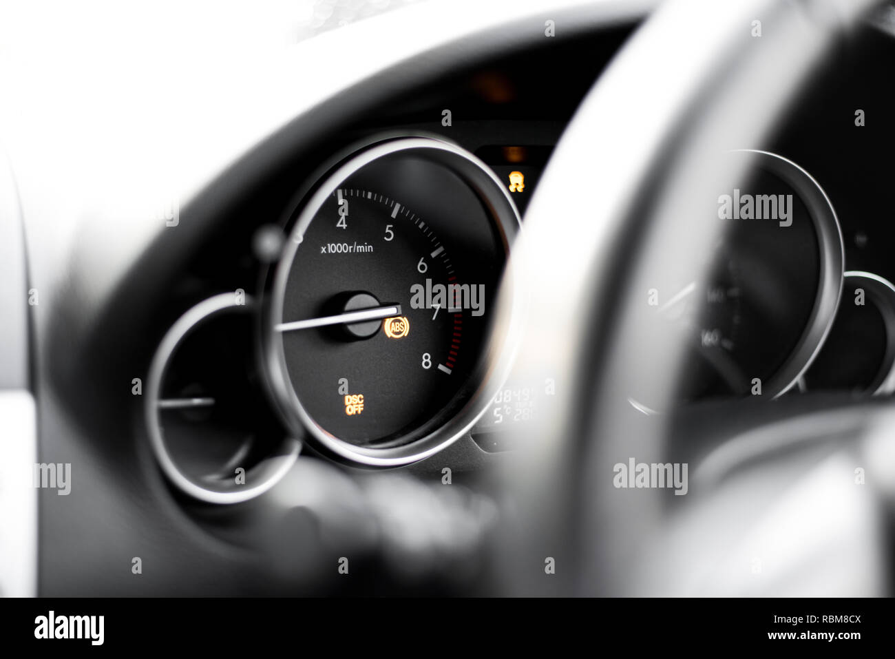 Vehicle dashboard gauge car breakdown traction control DSC light